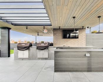Sundeck w/ firepits, bag set, jenga, outdoor tv's and spacious seating